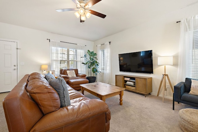 102 Tokalaun Dr, Hutto, TX 78634 - living area featuring ceiling fan and light carpet