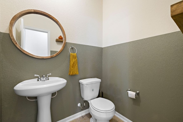 102 Tokalaun Dr, Hutto, TX 78634 - bathroom featuring toilet and baseboards