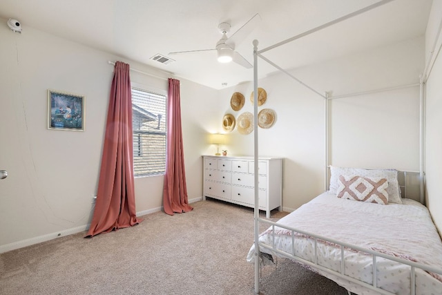 102 Tokalaun Dr, Hutto, TX 78634 - carpeted bedroom featuring a ceiling fan and baseboards