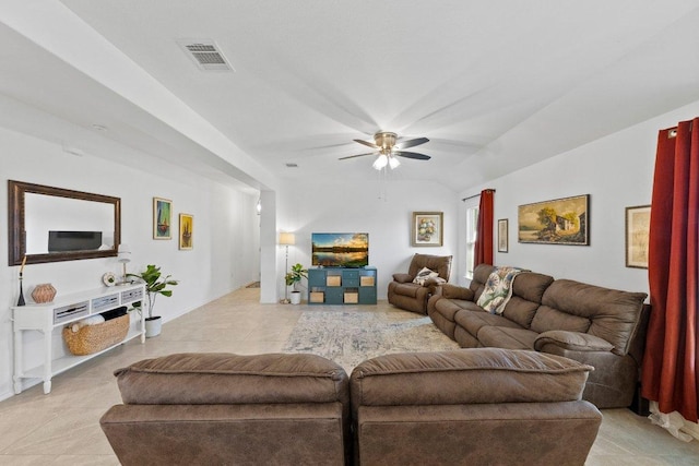 living room featuring light tile patterned floors, visible vents, and a ceiling fan