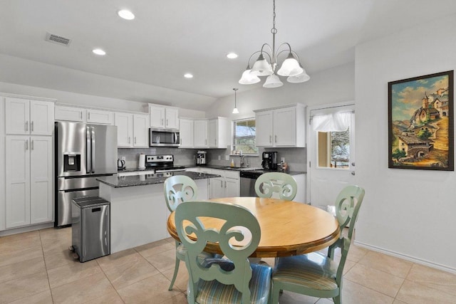 dining space with visible vents, recessed lighting, light tile patterned floors, baseboards, and vaulted ceiling