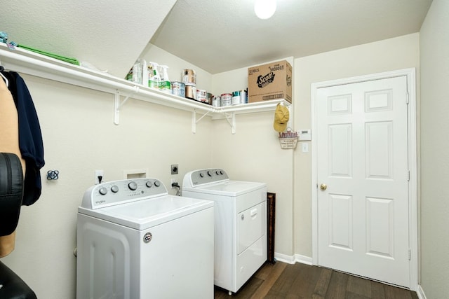 clothes washing area featuring baseboards, dark wood finished floors, laundry area, a textured ceiling, and separate washer and dryer