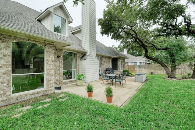 view of yard with a patio area and fence