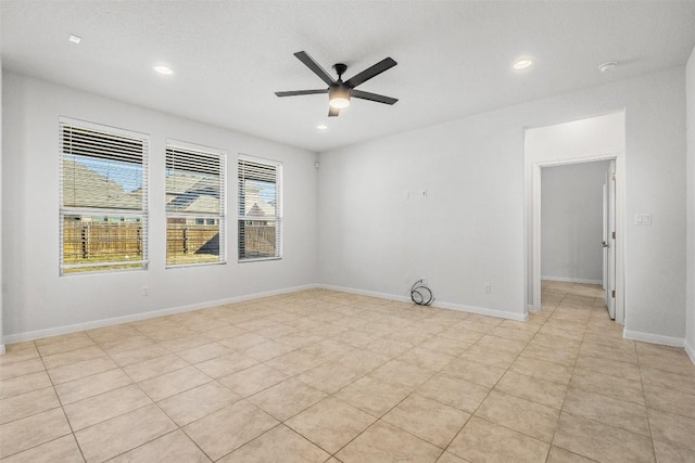 unfurnished room with recessed lighting, baseboards, and a ceiling fan