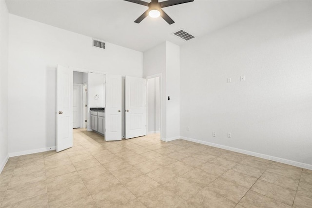 unfurnished bedroom with visible vents, baseboards, and ceiling fan