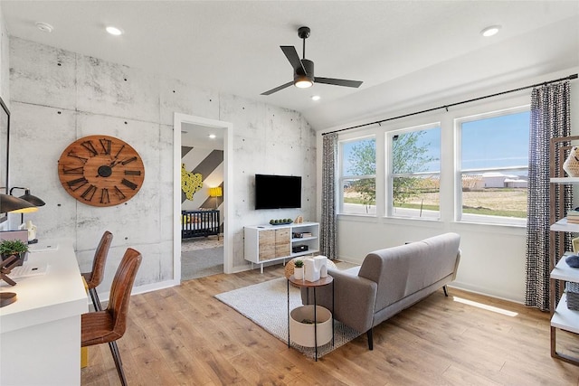 living room with vaulted ceiling, recessed lighting, ceiling fan, and wood finished floors