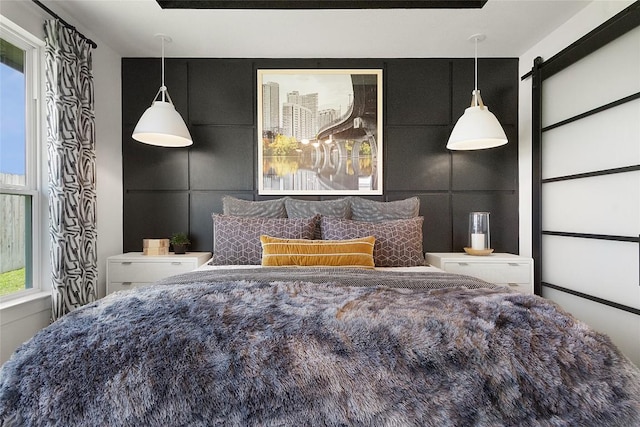 bedroom with a barn door