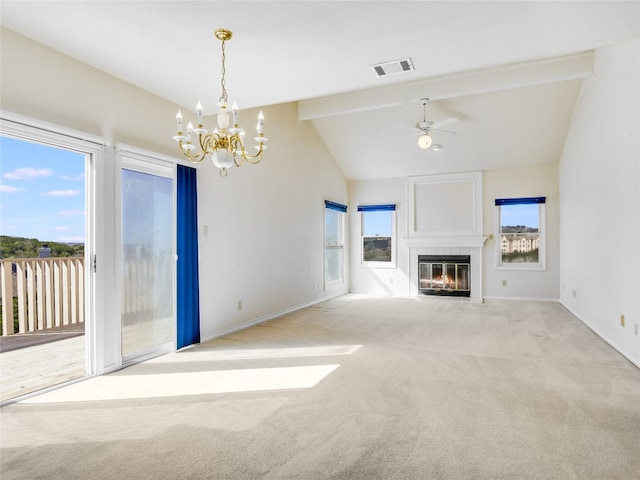 unfurnished living room featuring visible vents, a ceiling fan, a glass covered fireplace, carpet, and vaulted ceiling with beams