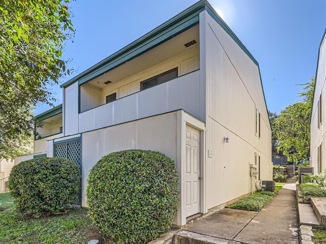 6718 Silvermine Dr Unit 404, Austin, TX 78736 - view of side of property featuring central AC unit