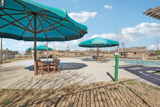 exterior space with a patio and fence