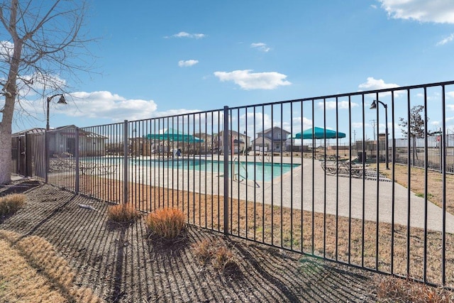 community pool with fence