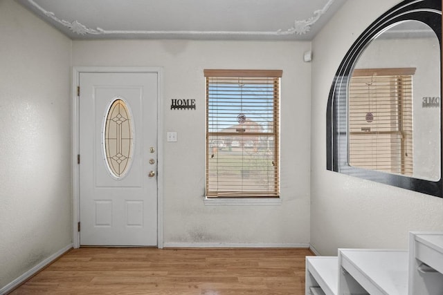 1100 Silverton Ct, Austin, TX 78753 - foyer with light wood-type flooring and baseboards