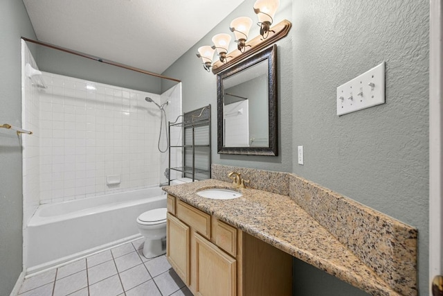 1100 Silverton Ct, Austin, TX 78753 - full bath with tile patterned flooring, toilet, vanity, shower / tub combination, and a textured wall