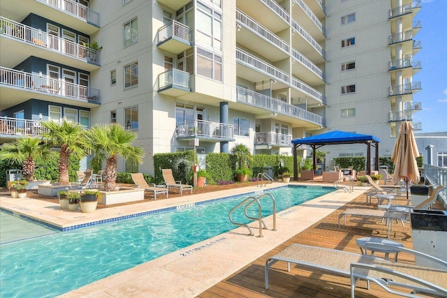 community pool with a patio