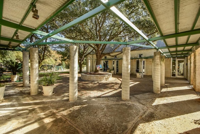 view of patio featuring an outdoor fire pit