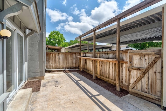 view of patio with fence