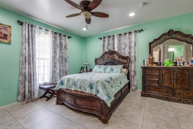 bedroom featuring light tile patterned floors, a ceiling fan, and recessed lighting