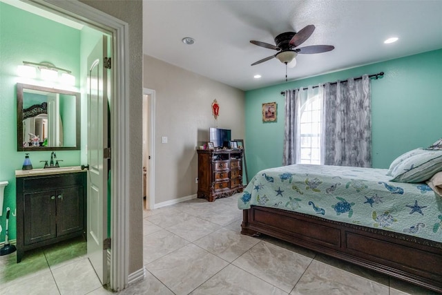 bedroom featuring recessed lighting, a ceiling fan, baseboards, and a sink