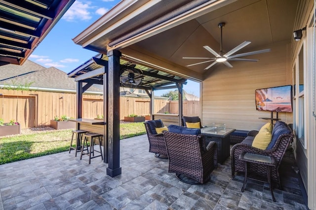 view of patio featuring ceiling fan and a fenced backyard