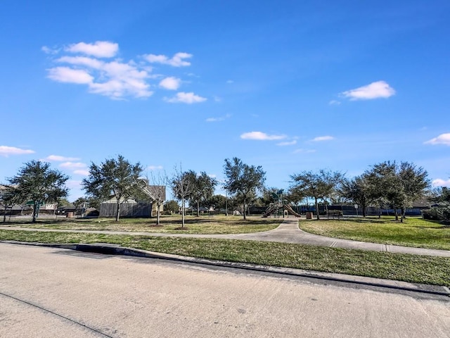 view of road featuring sidewalks and curbs