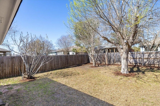 view of yard featuring a fenced backyard