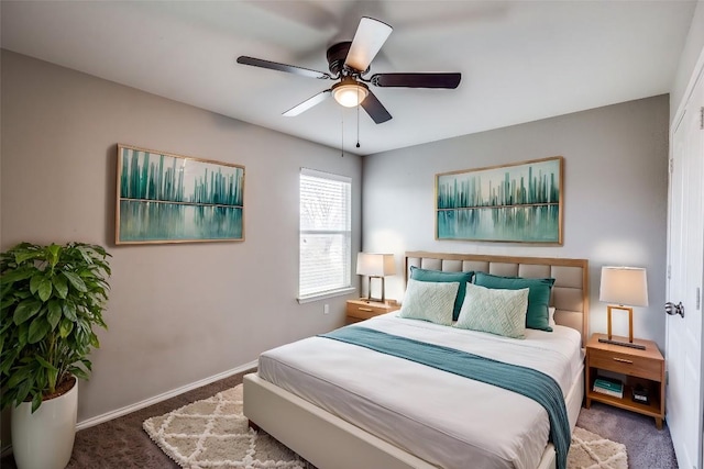 carpeted bedroom with baseboards and a ceiling fan