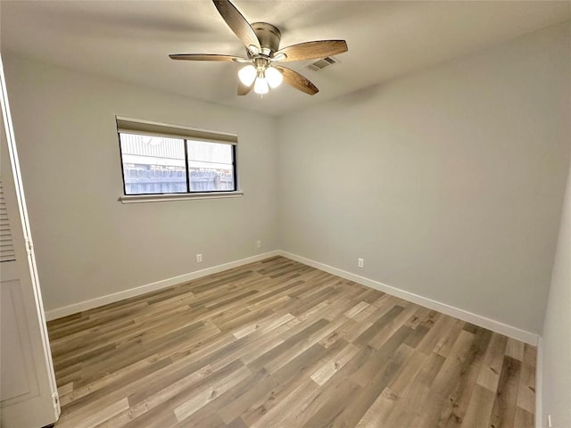 11740 D K Ranch Rd, Austin, TX 78759 - empty room with ceiling fan and light wood-style flooring