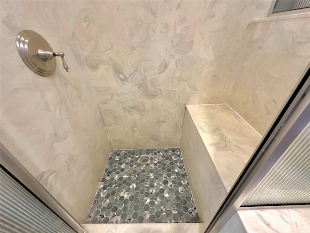 bathroom featuring walk in shower