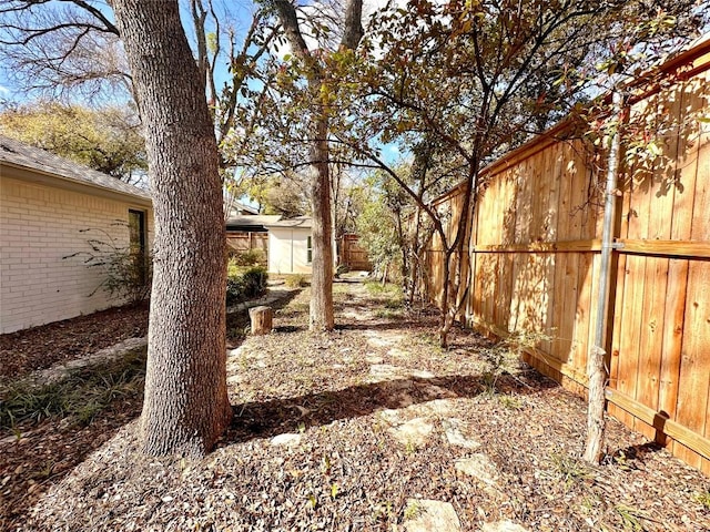 view of yard with fence