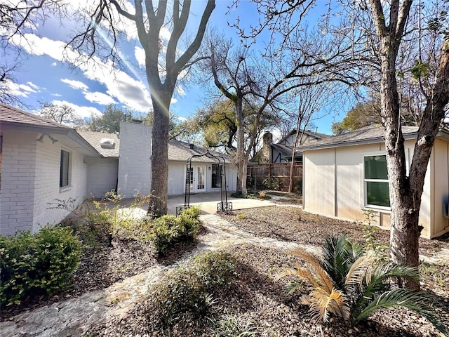 11740 D K Ranch Rd, Austin, TX 78759 - view of yard featuring a patio area