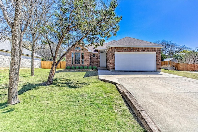 view of front of house featuring brick siding, concrete driveway, a front lawn, and fence