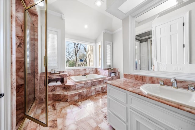 full bathroom with vanity, ornamental molding, a shower stall, a bath, and marble finish floor