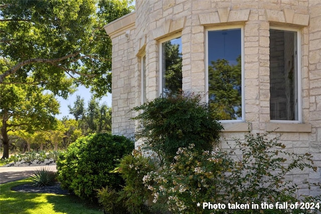 view of property exterior featuring stone siding