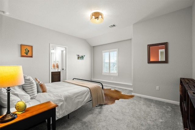 carpeted bedroom with visible vents, baseboards, and lofted ceiling