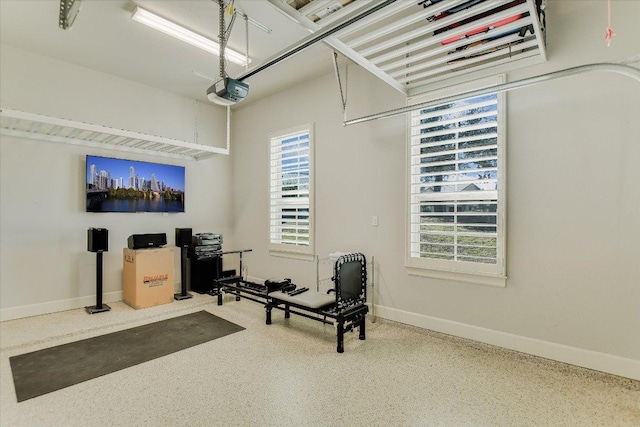 exercise area featuring baseboards