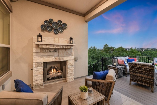 exterior space featuring an outdoor living space with a fireplace