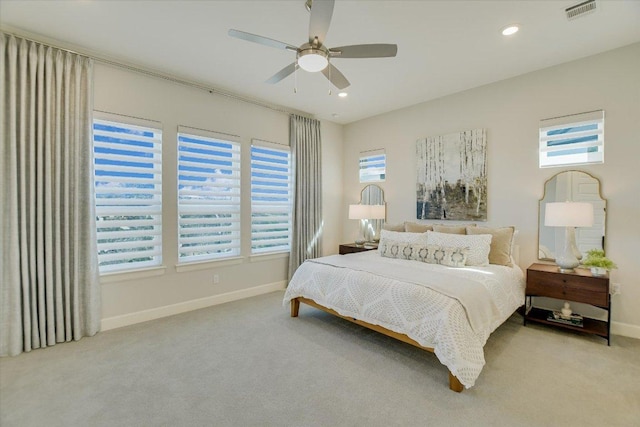 carpeted bedroom with recessed lighting, baseboards, visible vents, and ceiling fan