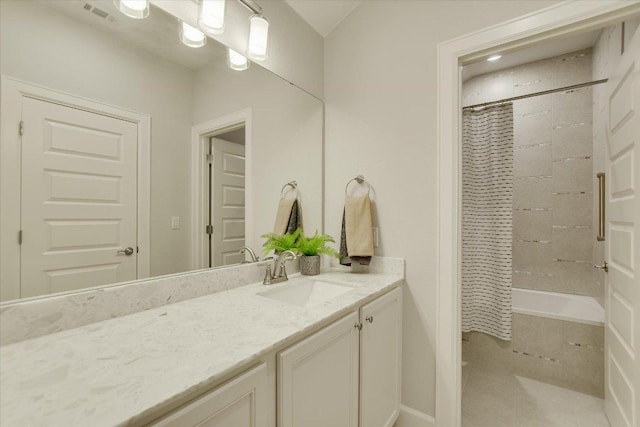 full bathroom with vanity, shower / bathtub combination with curtain, and visible vents