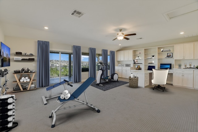 workout room featuring visible vents, recessed lighting, built in study area, and carpet