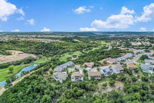 bird's eye view featuring a residential view and a water view