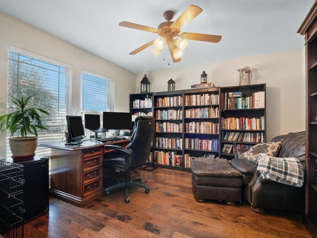 home office featuring a ceiling fan and dark wood-style floors