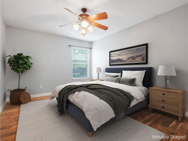 802 Wood Mesa Dr, Round Rock, TX 78665 - bedroom featuring wood finished floors and a ceiling fan