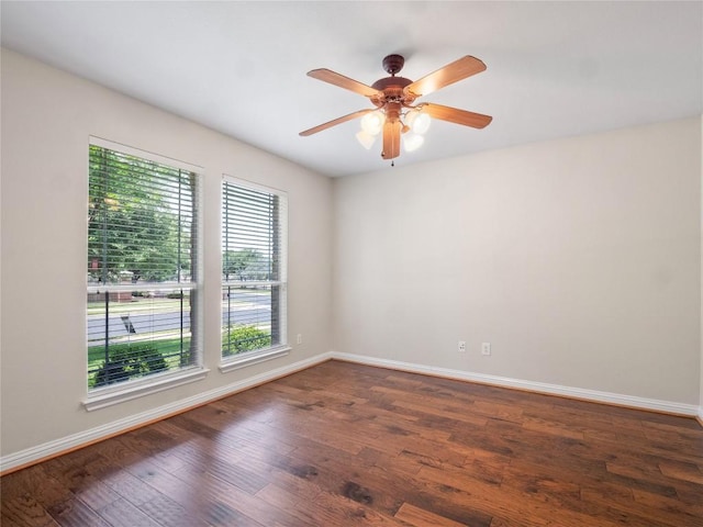802 Wood Mesa Dr, Round Rock, TX 78665 - empty room featuring dark wood-style floors and a ceiling fan
