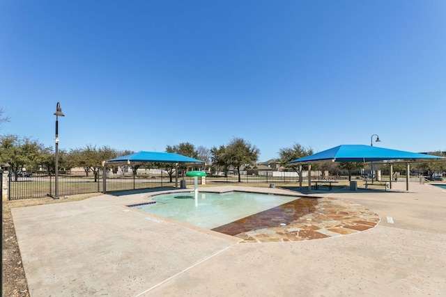 view of pool with fence