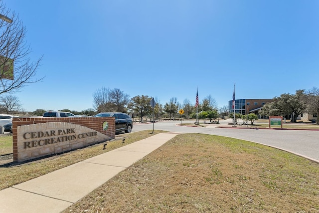 exterior space with traffic signs and sidewalks