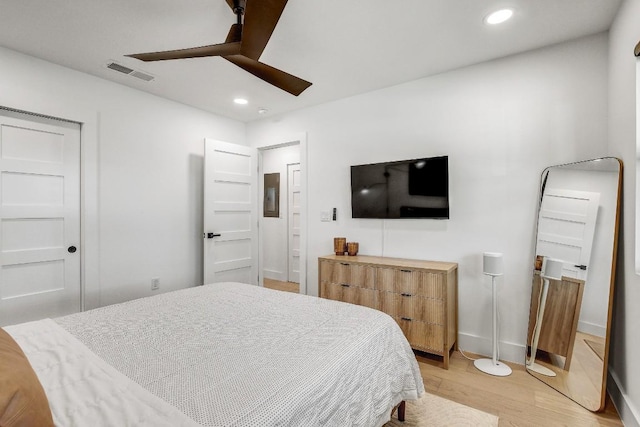 bedroom with a ceiling fan, light wood-style flooring, recessed lighting, and visible vents