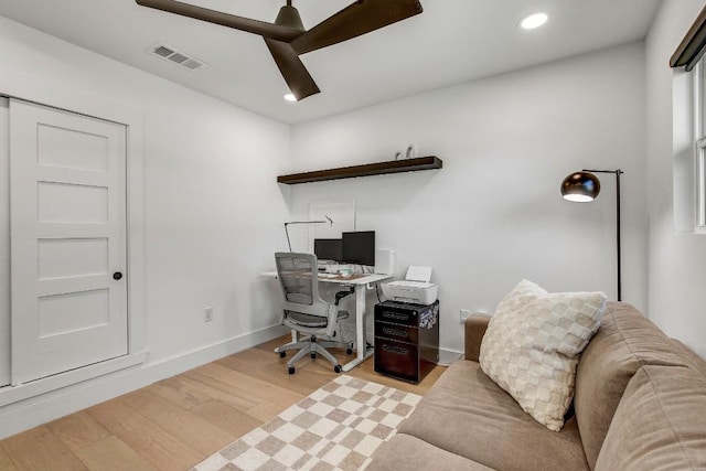 office featuring visible vents, baseboards, ceiling fan, recessed lighting, and wood finished floors