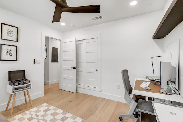 home office with visible vents, ceiling fan, baseboards, recessed lighting, and light wood-style floors