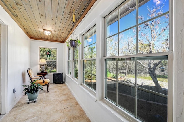 sunroom featuring wood ceiling