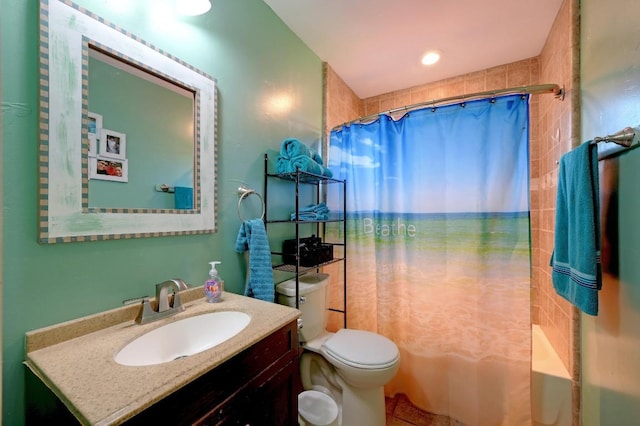 full bath featuring toilet, vanity, and shower / bath combination with curtain